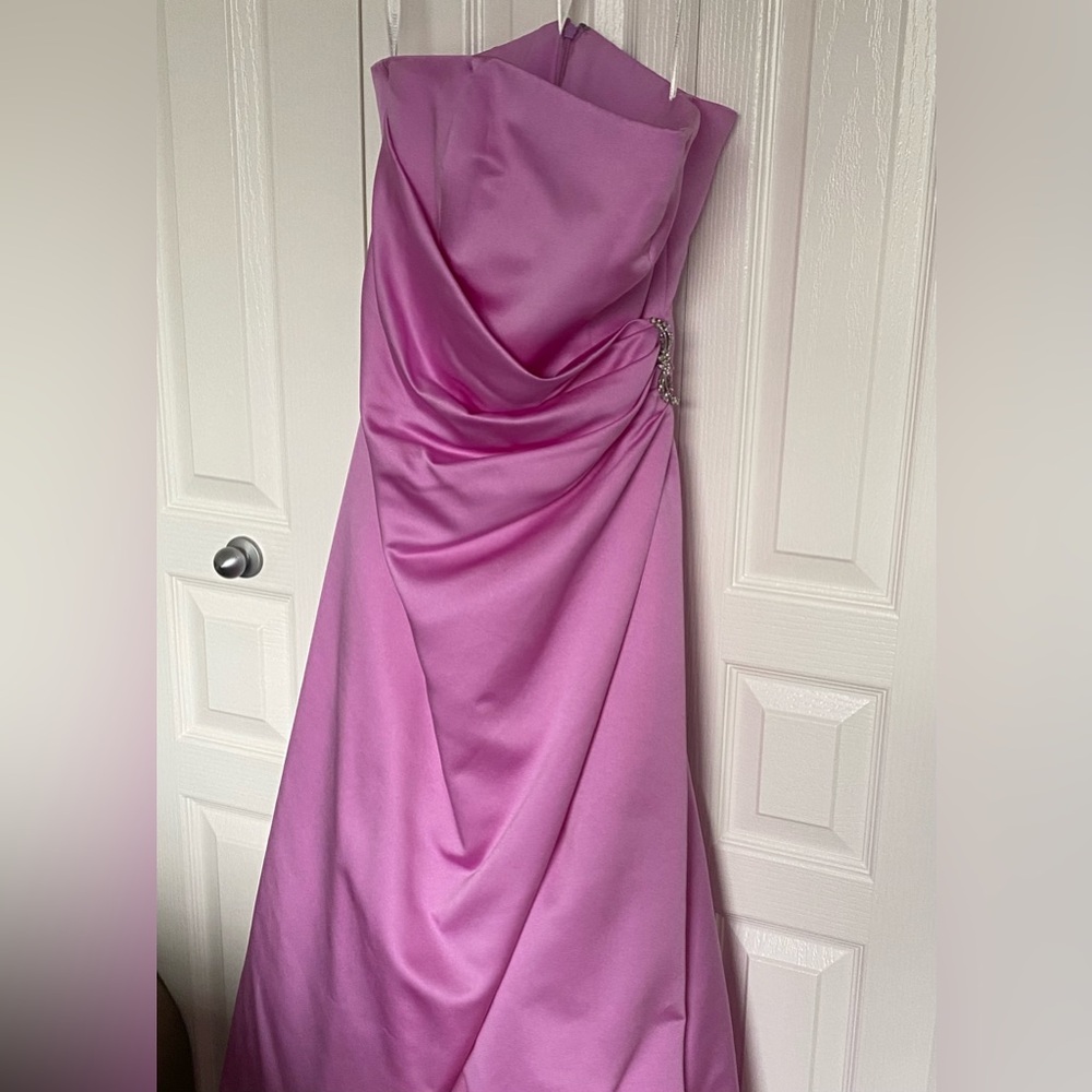 David’s Bridal. Pink strapless gown with rhinestone jewelry